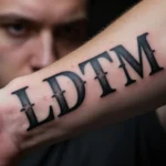Close-up shot of an LDTM style tattoo